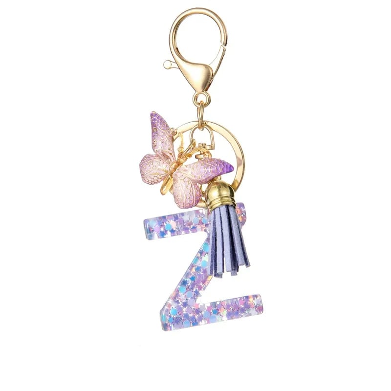 Pendentif lettre papillon Kuschelwohl™ avec pompon – Coloré et personnalisé (Vente de Noël 🎄)