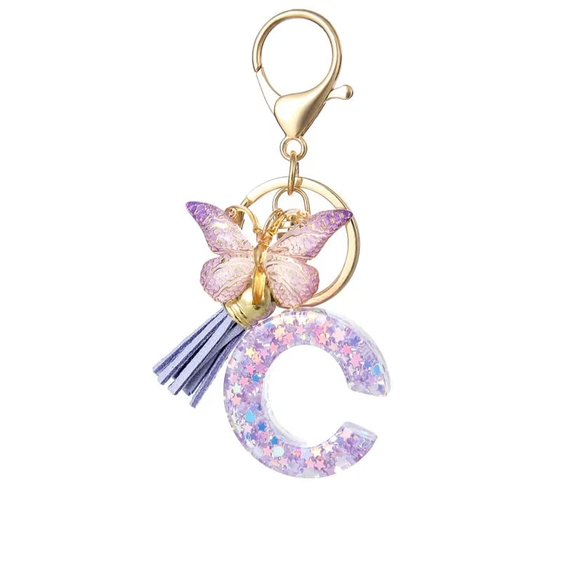 Pendentif lettre papillon Kuschelwohl™ avec pompon – Coloré et personnalisé (Vente de Noël 🎄)