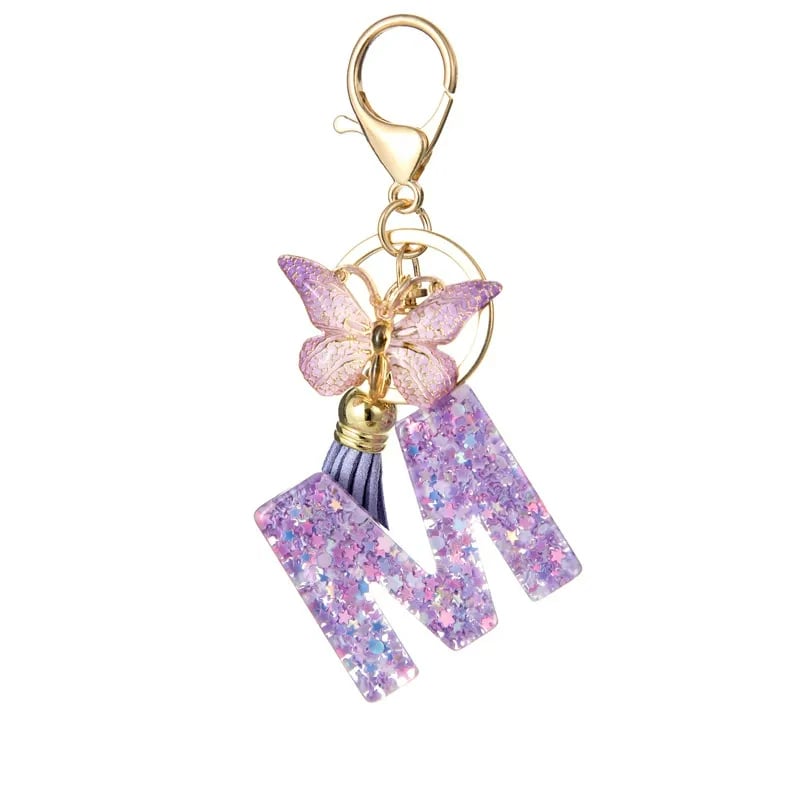Pendentif lettre papillon Kuschelwohl™ avec pompon – Coloré et personnalisé (Vente de Noël 🎄)