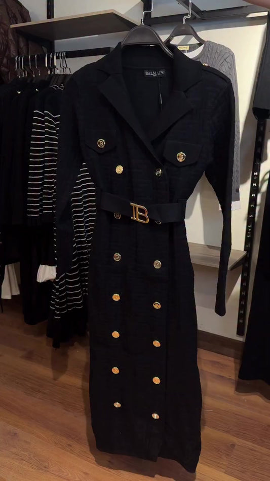 B-buckle belt cinches the waist for a slimming long-sleeved knit cardigan.