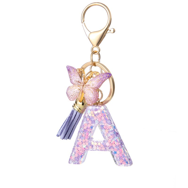 Pendentif lettre papillon Kuschelwohl™ avec pompon – Coloré et personnalisé (Vente de Noël 🎄)