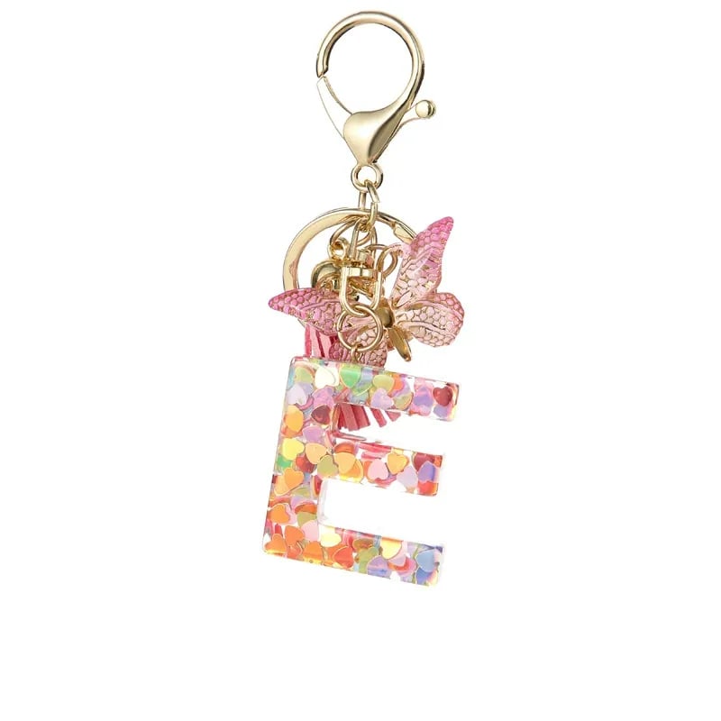 Pendentif lettre papillon Kuschelwohl™ avec pompon – Coloré et personnalisé (Vente de Noël 🎄)