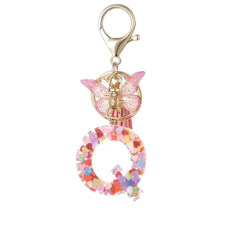 Pendentif lettre papillon Kuschelwohl™ avec pompon – Coloré et personnalisé (Vente de Noël 🎄)
