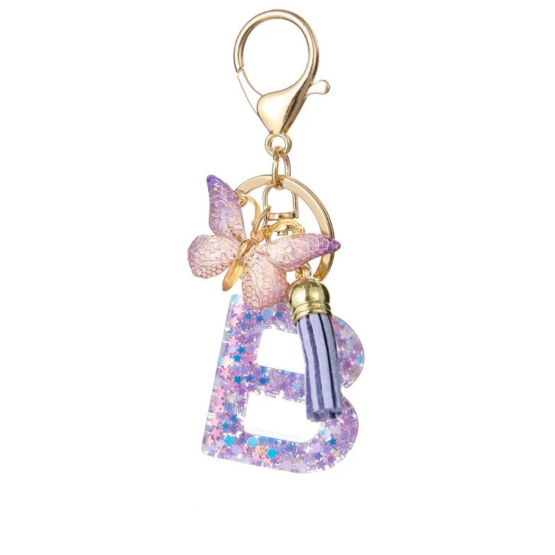 Pendentif lettre papillon Kuschelwohl™ avec pompon – Coloré et personnalisé (Vente de Noël 🎄)