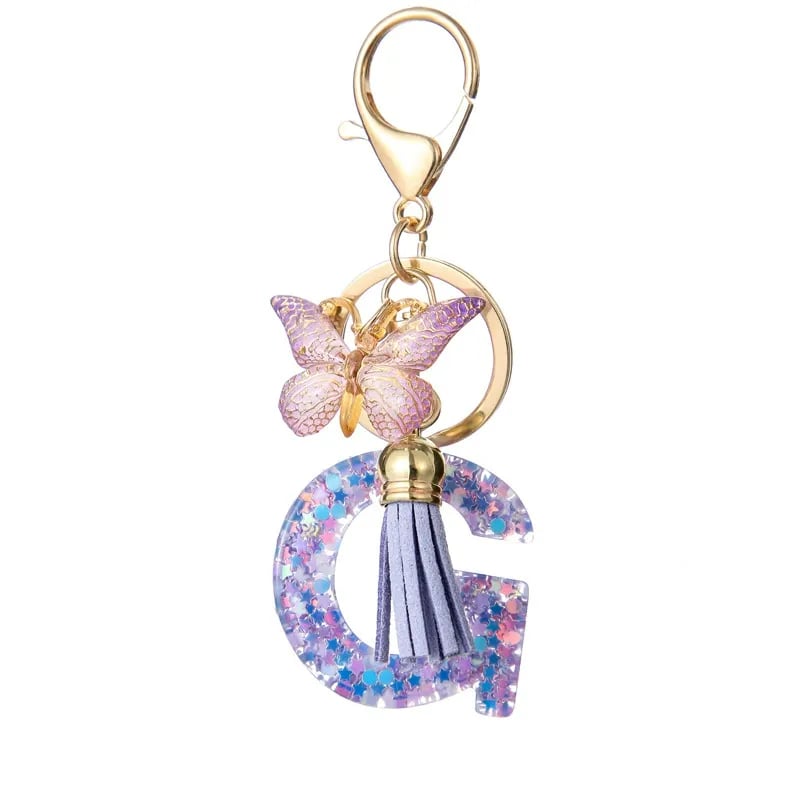 Pendentif lettre papillon Kuschelwohl™ avec pompon – Coloré et personnalisé (Vente de Noël 🎄)