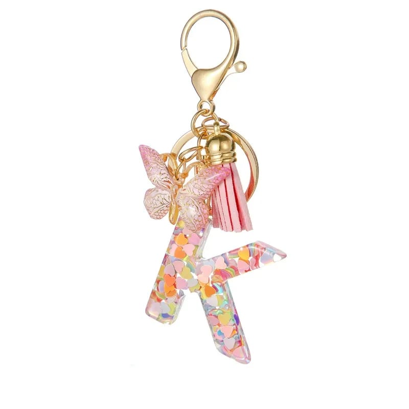 Pendentif lettre papillon Kuschelwohl™ avec pompon – Coloré et personnalisé (Vente de Noël 🎄)