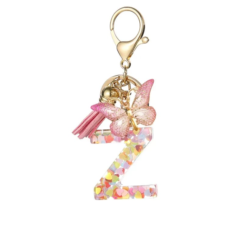 Pendentif lettre papillon Kuschelwohl™ avec pompon – Coloré et personnalisé (Vente de Noël 🎄)