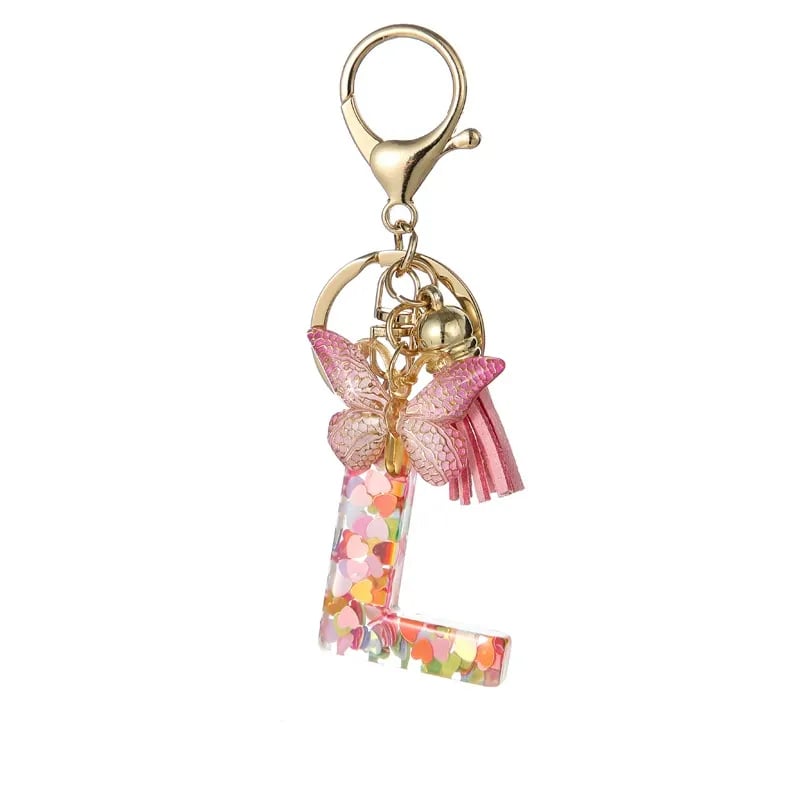 Pendentif lettre papillon Kuschelwohl™ avec pompon – Coloré et personnalisé (Vente de Noël 🎄)
