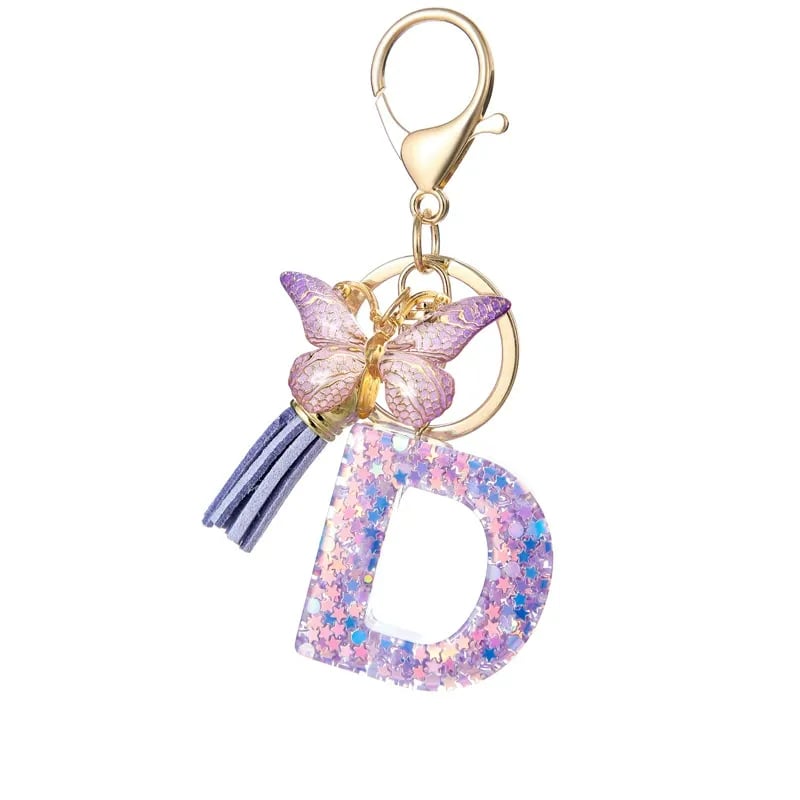 Pendentif lettre papillon Kuschelwohl™ avec pompon – Coloré et personnalisé (Vente de Noël 🎄)