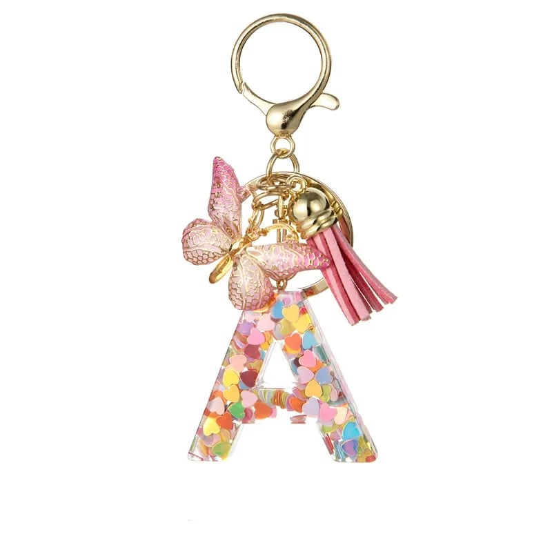 Pendentif lettre papillon Kuschelwohl™ avec pompon – Coloré et personnalisé (Vente de Noël 🎄)