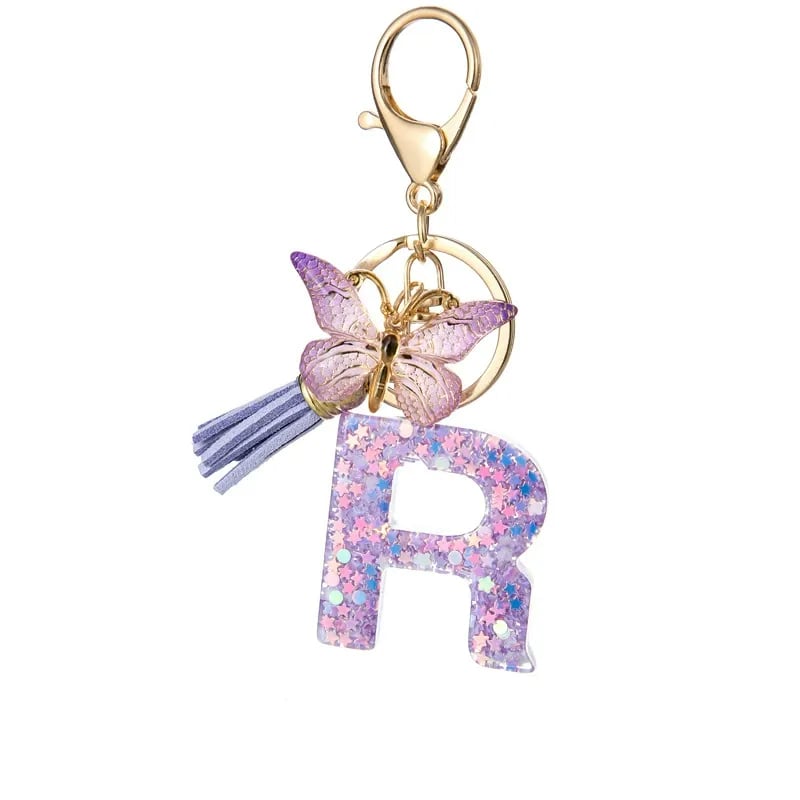 Pendentif lettre papillon Kuschelwohl™ avec pompon – Coloré et personnalisé (Vente de Noël 🎄)