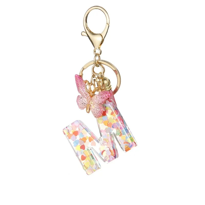 Pendentif lettre papillon Kuschelwohl™ avec pompon – Coloré et personnalisé (Vente de Noël 🎄)
