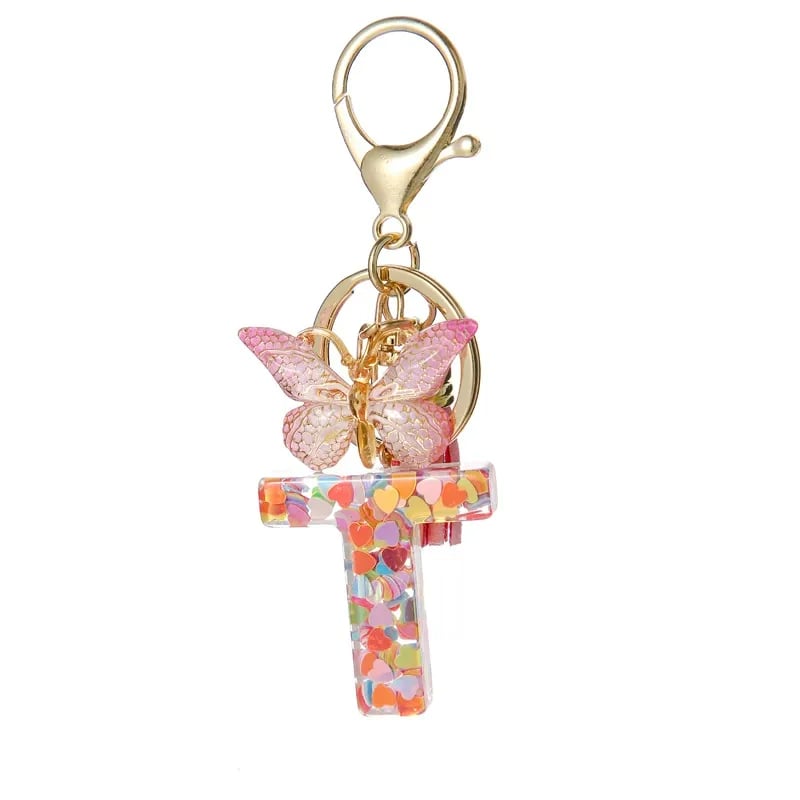 Pendentif lettre papillon Kuschelwohl™ avec pompon – Coloré et personnalisé (Vente de Noël 🎄)