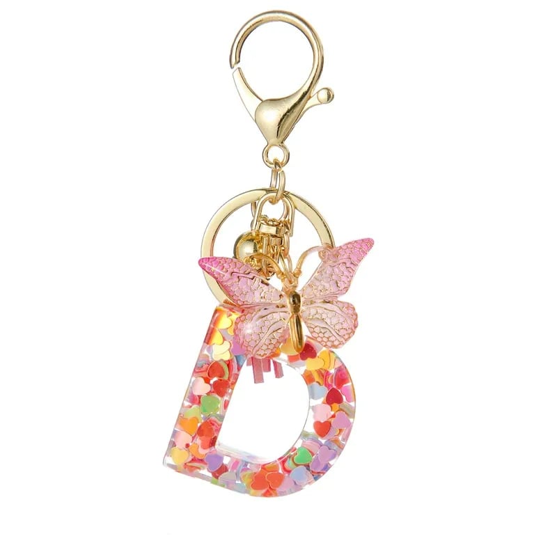Pendentif lettre papillon Kuschelwohl™ avec pompon – Coloré et personnalisé (Vente de Noël 🎄)