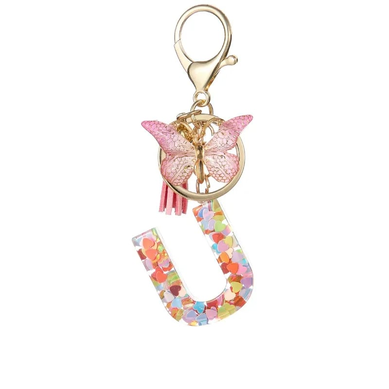 Pendentif lettre papillon Kuschelwohl™ avec pompon – Coloré et personnalisé (Vente de Noël 🎄)