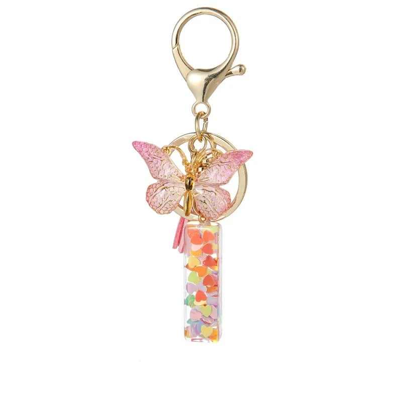 Pendentif lettre papillon Kuschelwohl™ avec pompon – Coloré et personnalisé (Vente de Noël 🎄)