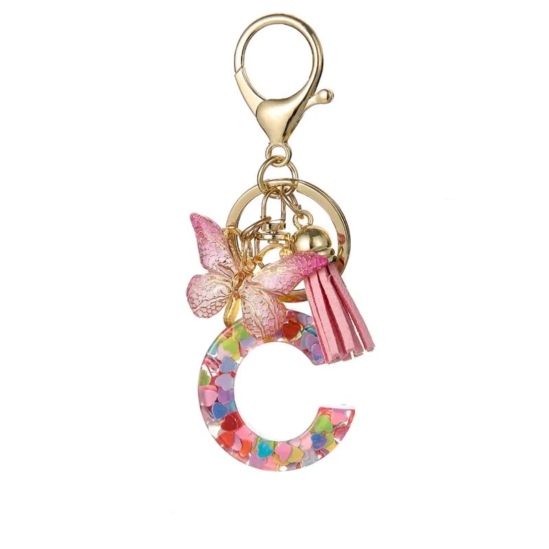 Pendentif lettre papillon Kuschelwohl™ avec pompon – Coloré et personnalisé (Vente de Noël 🎄)