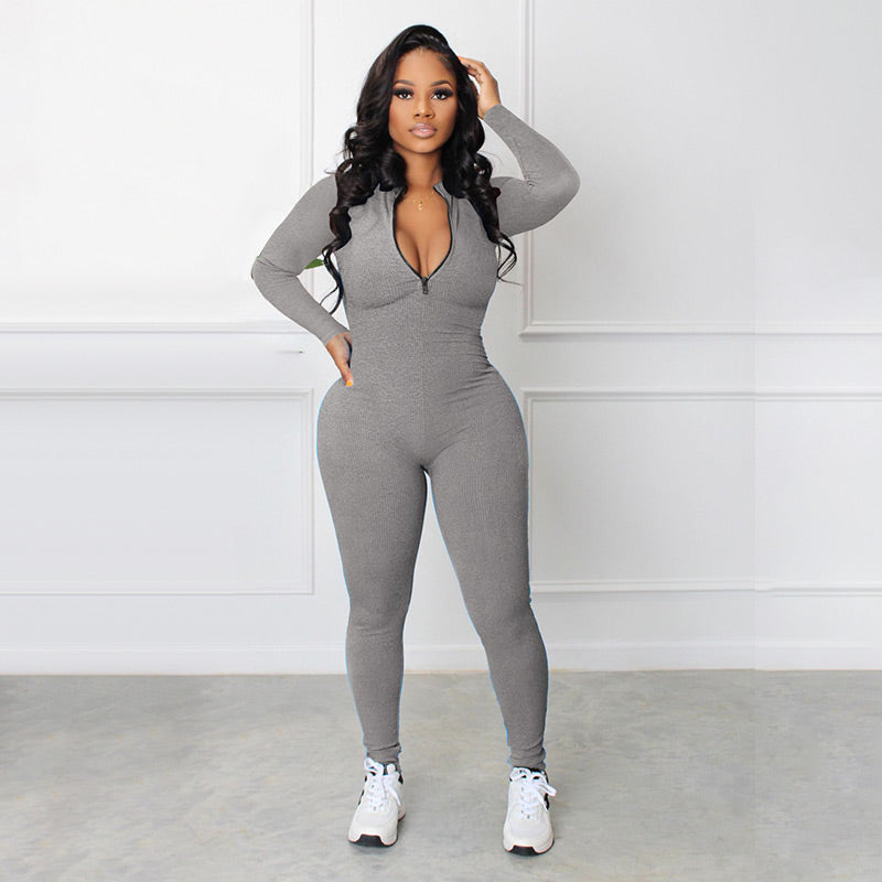 Nahtloser Jumpsuit in Unifarbe mit halbem Reißverschluss